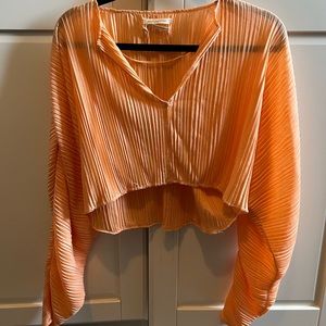 Urban Outfitters flowy coral/orange crop top.
